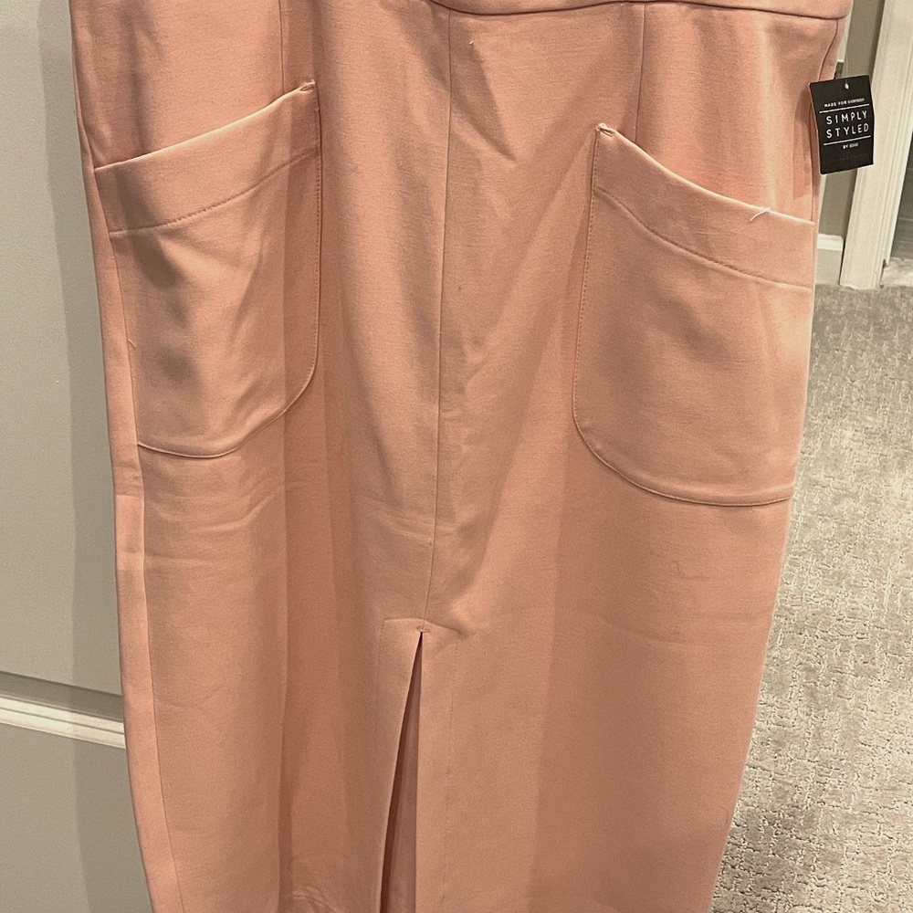 Beautiful pink skirt new with tags; size 14